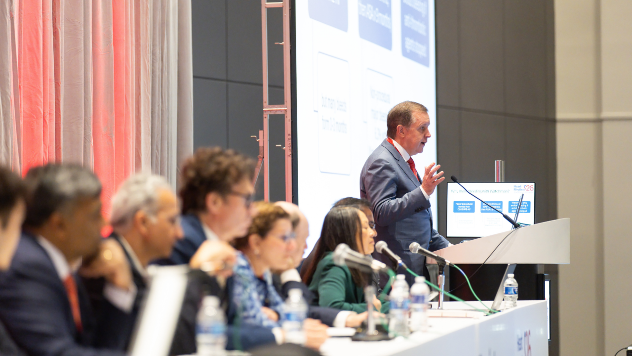 A physician presents to an expert panel during a Heart Rhythm 2026 late-breaking session.
