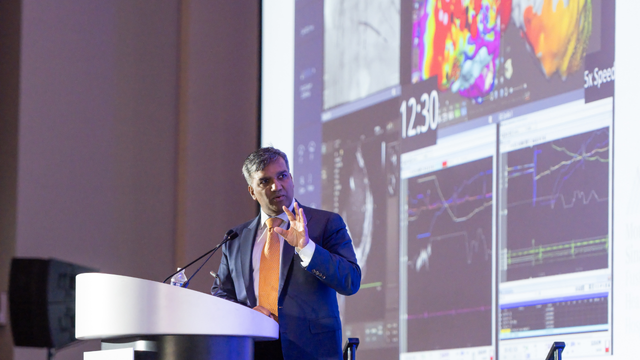 Claude responded: A physician presents cardiac imaging and electrophysiology data during a Heart Rhythm 2026 session.A physician presents cardiac imaging and electrophysiology data during a Heart Rhythm 2026 session.